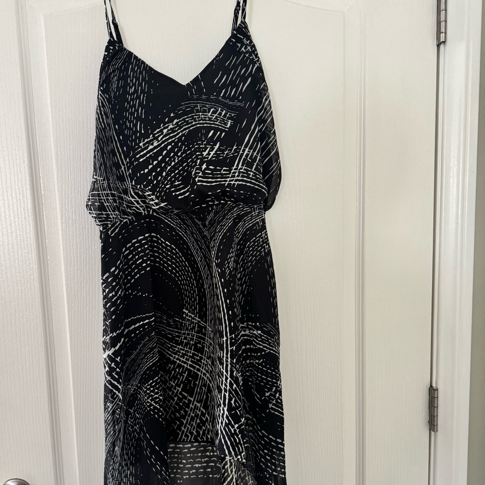 Chic Black Dress with White Abstract Design